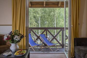 Фото номера Улучшенный семейный номер Отель Hotel Masuria г. Лукта 3